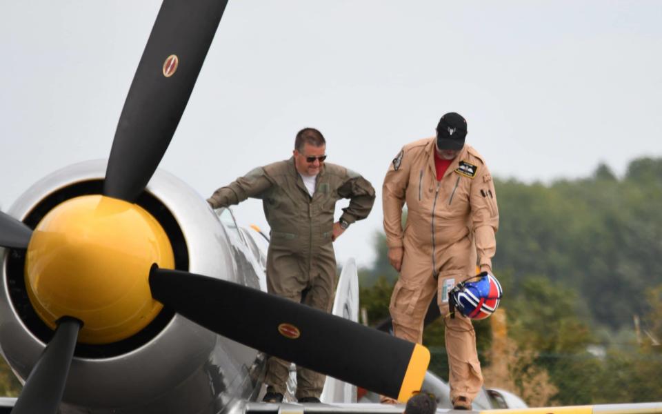 Dave Unwin, 59, and test pilot Eskil Amdal had just performed a loop in a 1951 Hawker Sea Fury when the engine suddenly cut out at 2,000ft - SWNS