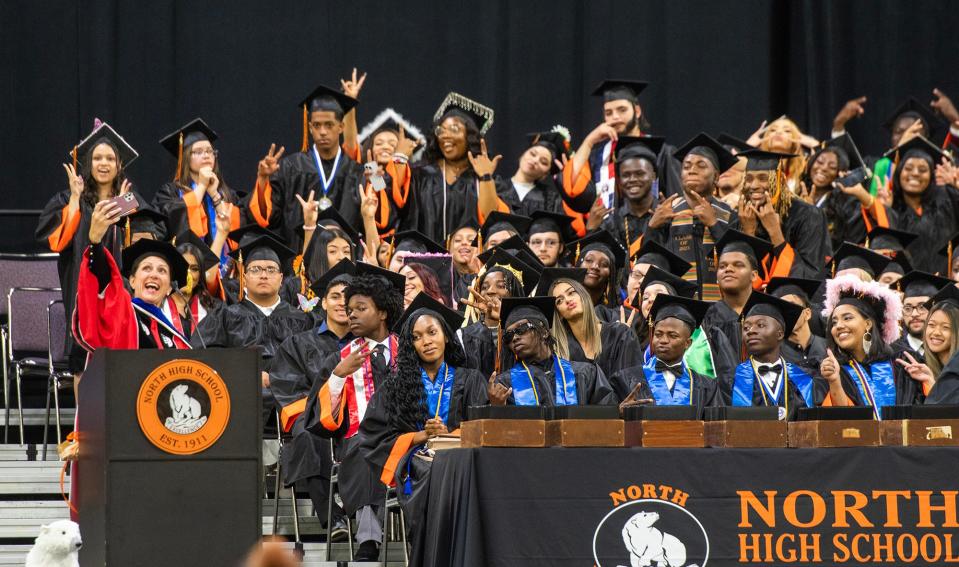 Worcester Superintendent of Schools Rachel H. Monárrez takes a selfie with the North High School graduates during commencement Monday at the DCU Center.