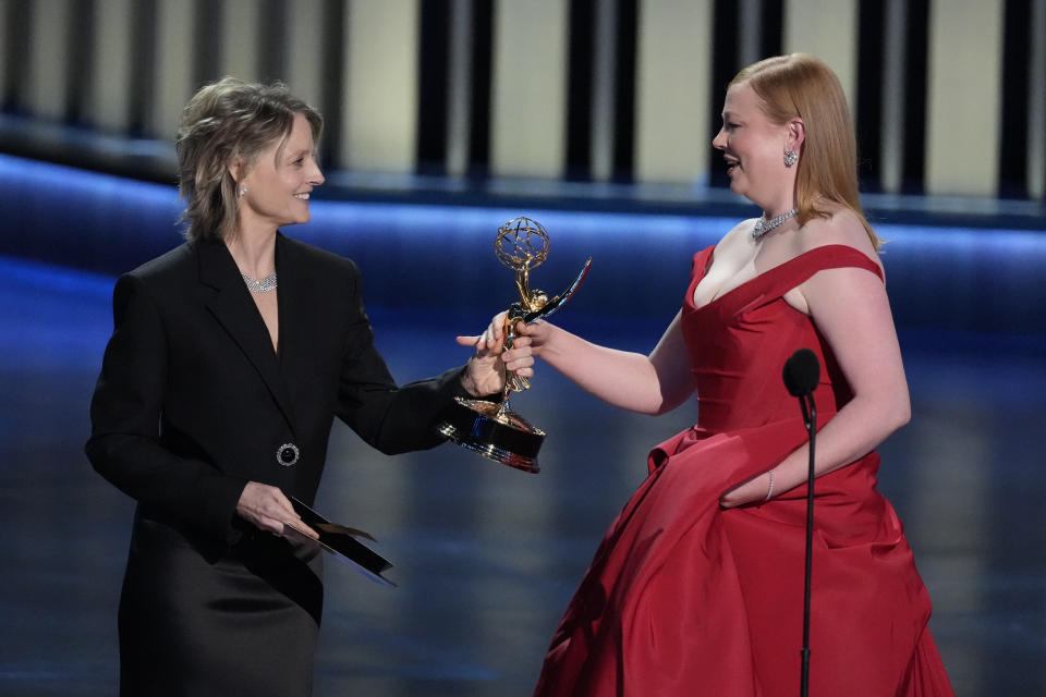 Jodie Foster presents the award for outstanding lead actress in a drama series to Sarah Snook for "Succession" during the 75th Primetime Emmy Awards on Monday, Jan. 15, 2024, at the Peacock Theater in Los Angeles. (AP Photo/Chris Pizzello)