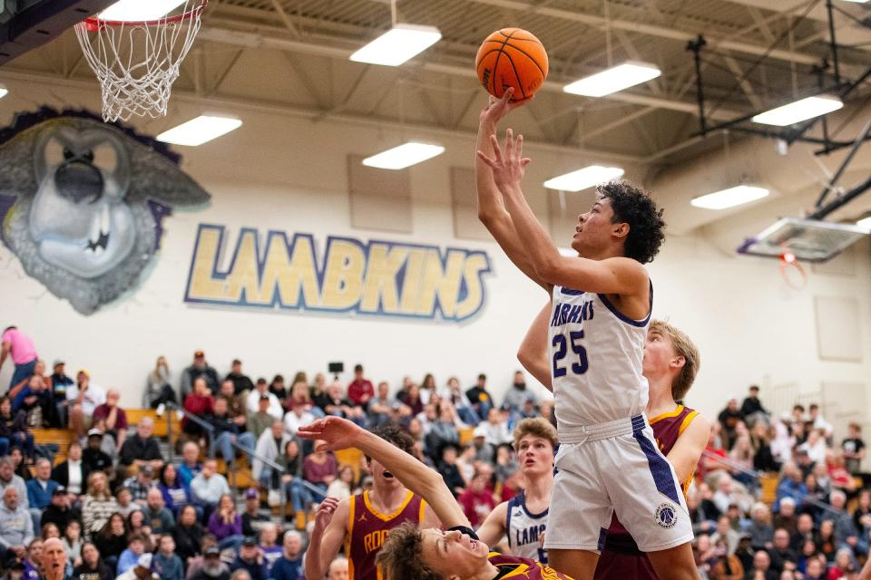 Fort Collins High School's Marcel Herrera puts up a shot during a game against Rocky Mountain High School in Fort Collins, Colo., on Thursday, Feb. 15, 2024.