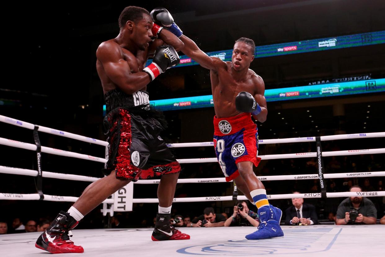 Day (right) was rushed to hospital after Saturday's fight: Getty Images