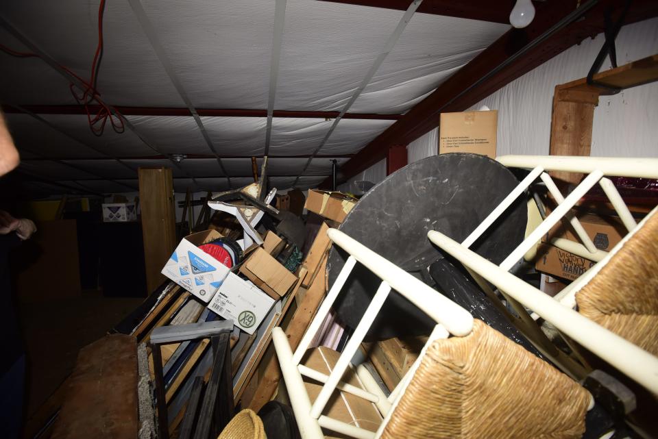 Various old theater props and set pieces clustered inside the theatre's storage facility at Klecha Park in St. Clair on Wednesday, August 3, 2022.