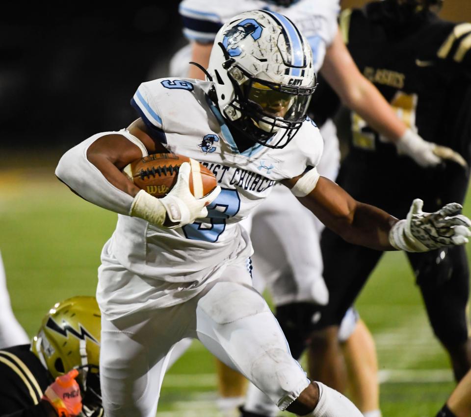 Christ Church's Dashun Reeder (9) runs the ball for a touchdown during the A State Championship game at Benedict College in Columbia, S.C. on Friday, Dec. 2, 2022. 