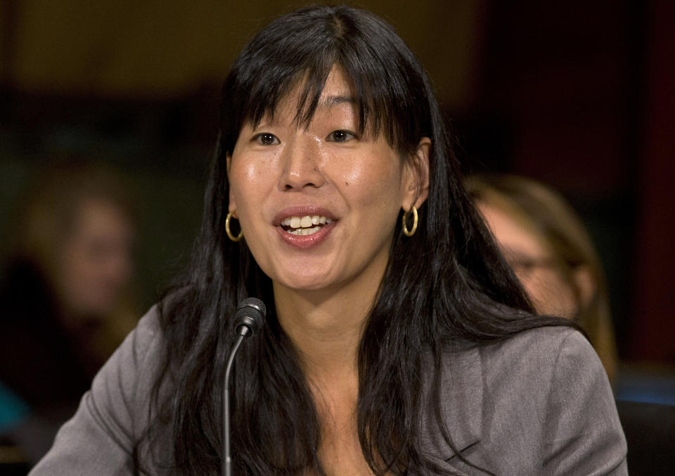 FILE - In this March 18, 2013, file photo, Ai-jen Poo, director of the National Domestic Workers Alliance, testifies at a Senate Judiciary Committee hearing on immigrant women and immigration reform on Capitol Hill in Washington. Poo and two other women of the nation's most influential activists are launching a new organization that aims to harness the political power of women to influence elections and shape local and national policy priorities. (AP Photo/Jacquelyn Martin, File)