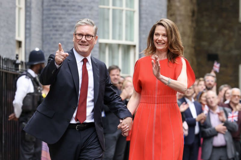 Prime Minister Keir Starmer and his wife, Victoria, arrive at Number 10 Downing Street in London, ahead of delivering his first speech to the nation as the head of government. Photo by Rory Arnold/No 10 Downing Street/UPI