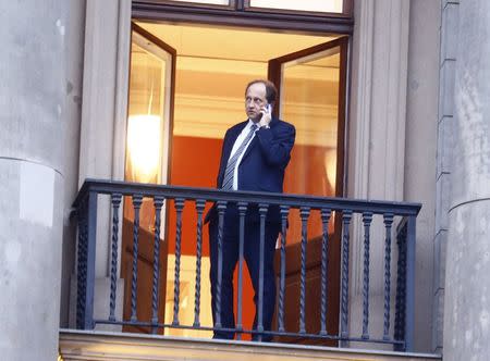 Alexander Graf Lambsdorff of the Free Democratic Party (FDP) talks on his mobile phone on a balcony of the German Parliamentary Society during exploratory talks about forming a new coalition government in Berlin, Germany, November 16, 2017. REUTERS/Hannibal Hanschke