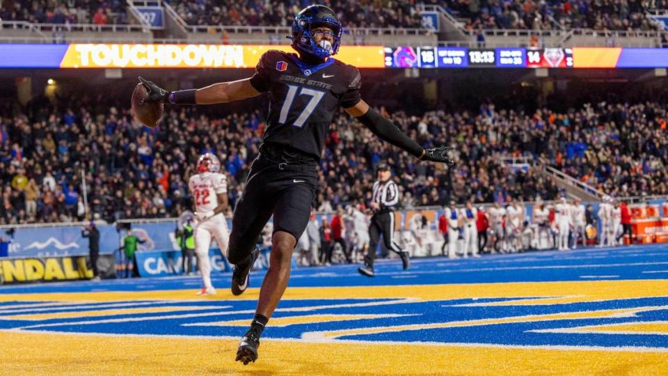 Boise State wide receiver Prince Strachan celebrates his 74-yard touchdown catch and run against New Mexico in the 2nd quarter, Saturday, Nov. 11, 2023, at Albertsons Stadium in Boise.