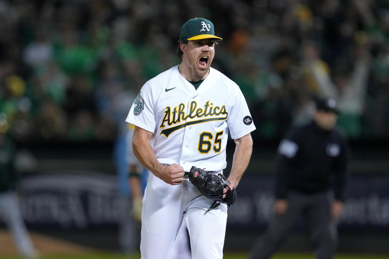 Trevor May had a candid message for John Fisher on his way out. (Brandon Vallance/Getty Images)