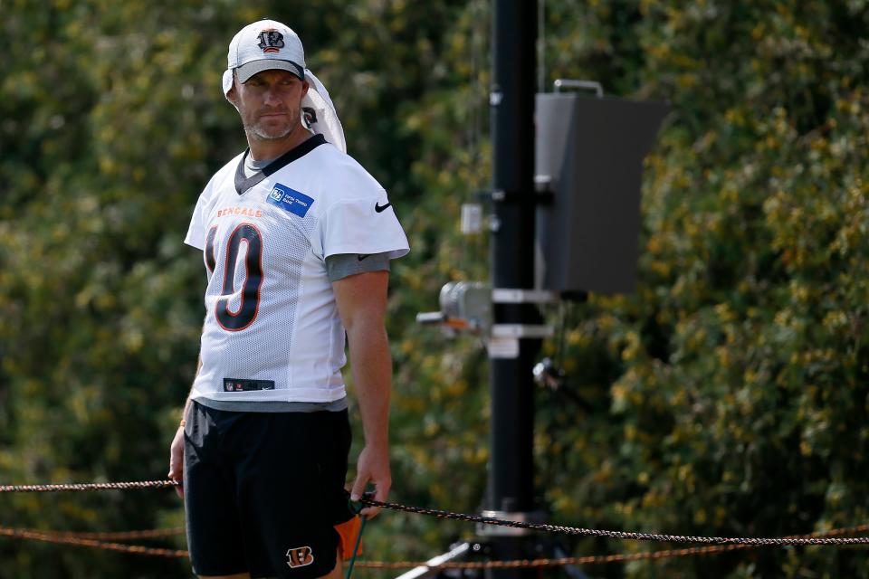 Cincinnati Bengals punter Kevin Huber (10) stands by between drills during training camp practice at the Paul Brown Stadium practice field in downtown Cincinnati on Monday, Aug. 2, 2021.