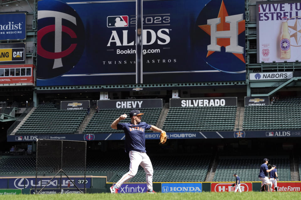 Houston Astros third baseman Alex Bregman throws to first during an ALDS baseball workout Friday, Oct. 6, 2023, in Houston. The Astros will host the Minnesota Twins in Game 1 of an ALDS series Saturday. (AP Photo/David J. Phillip)