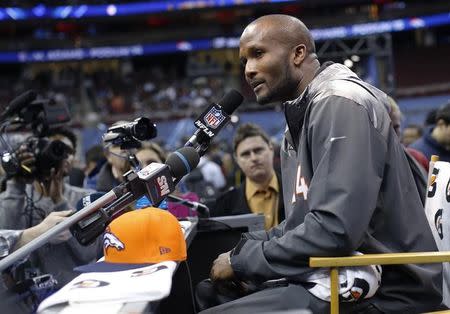 Denver Broncos cornerback Champ Bailey answers questions during Media Day for Super Bowl XLVIII at the Prudential Center in Newark, New Jersey January 28, 2014. The Broncos will go to the gridiron for their Super Bowl showdown against the Seattle Seahawks on February 2. REUTERS/Shannon Stapleton