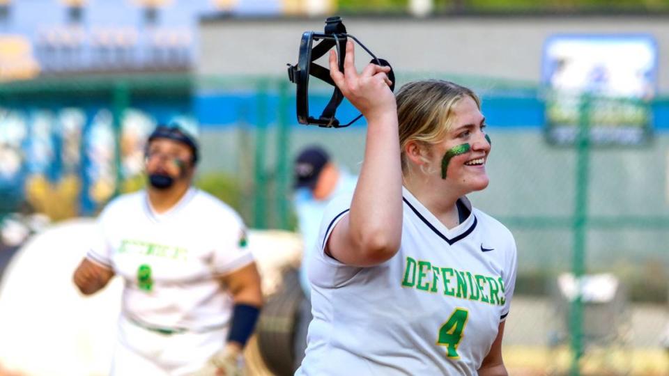 Bryan Station pitcher Karsyn Rockvoan (4) celebrates following the Defenders’ win against Henry Clay in the 42nd District Tournament semifinals on Wednesday.