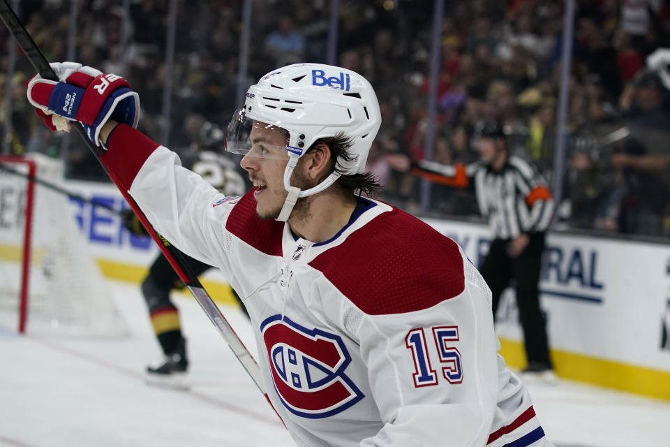 FILE - In this June 22, 2021, file photo, Montreal Canadiens center Jesperi Kotkaniemi (15) celebrates his goal against the Vegas Golden Knights during the first period in Game 5 of an NHL hockey Stanley Cup semifinal playoff series in Las Vegas. The Carolina Hurricanes have tendered an offer sheet to Canadiens restricted free agent Kotkaniemi. It's a one-year deal worth $6.1 million. The Canadiens have seven days to match or receive a first- and a third-round pick as compensation. (AP Photo/John Locher, File)