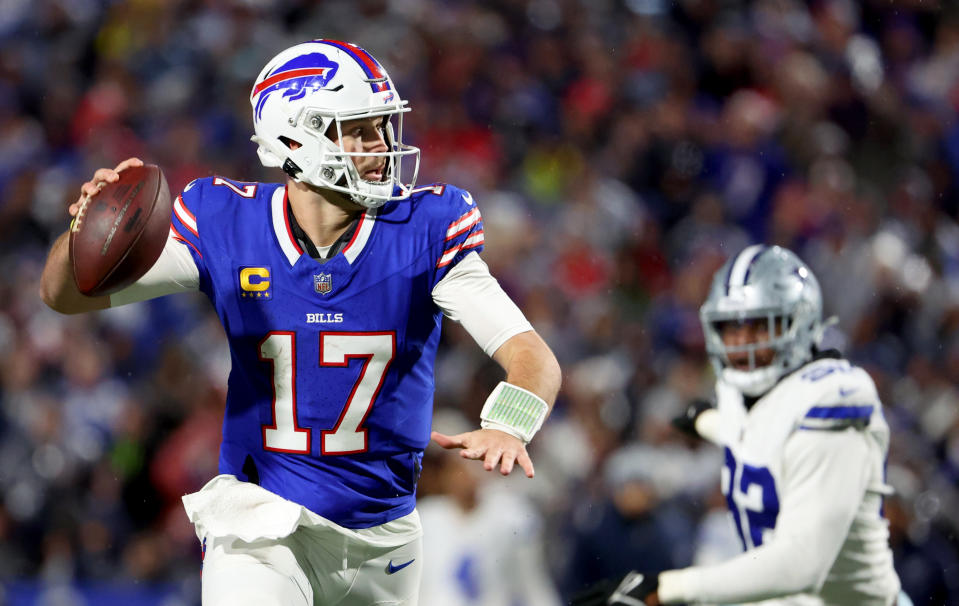 ORCHARD PARK, NEW YORK - DECEMBER 17: Josh Allen #17 of the Buffalo Bills looks to throw a pass against the Dallas Cowboys at Highmark Stadium on December 17, 2023 in Orchard Park, New York. (Photo by Timothy T Ludwig/Getty Images)