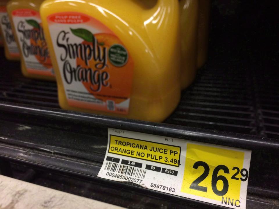 A tag lists the price of a jug of orange juice at a grocery store in Iqaluit, Nunavut on December 8, 2014.