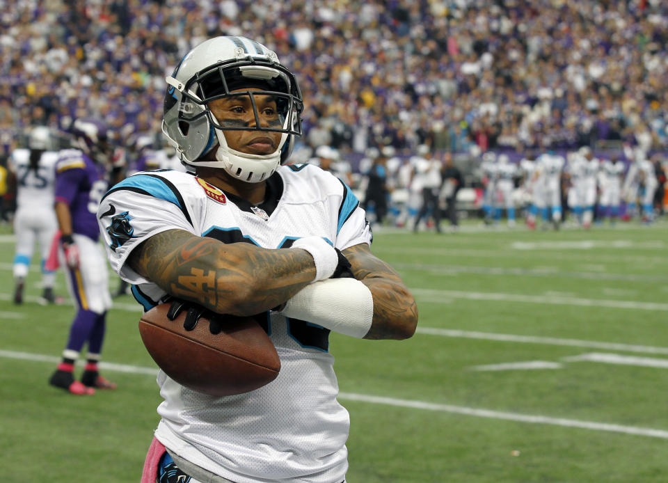 FILE - In this Oct. 13, 2013 file photo, Carolina Panthers wide receiver Steve Smith crosses his arms after a touchdown catch against the Minnesota Vikings during the first half of an NFL football game in Minneapolis. The agent for Smith says the five-time Pro Bowl selection has played his final snap for the Panthers. Smith's longtime representative Derrick Fox told The Associated Press on Wednesday, March 12, 2014, that Smith "is not going to play for the Panthers next year, I know that. I just don't know when that transaction is going to take place." (AP Photo/Ann Heisenfelt, File)