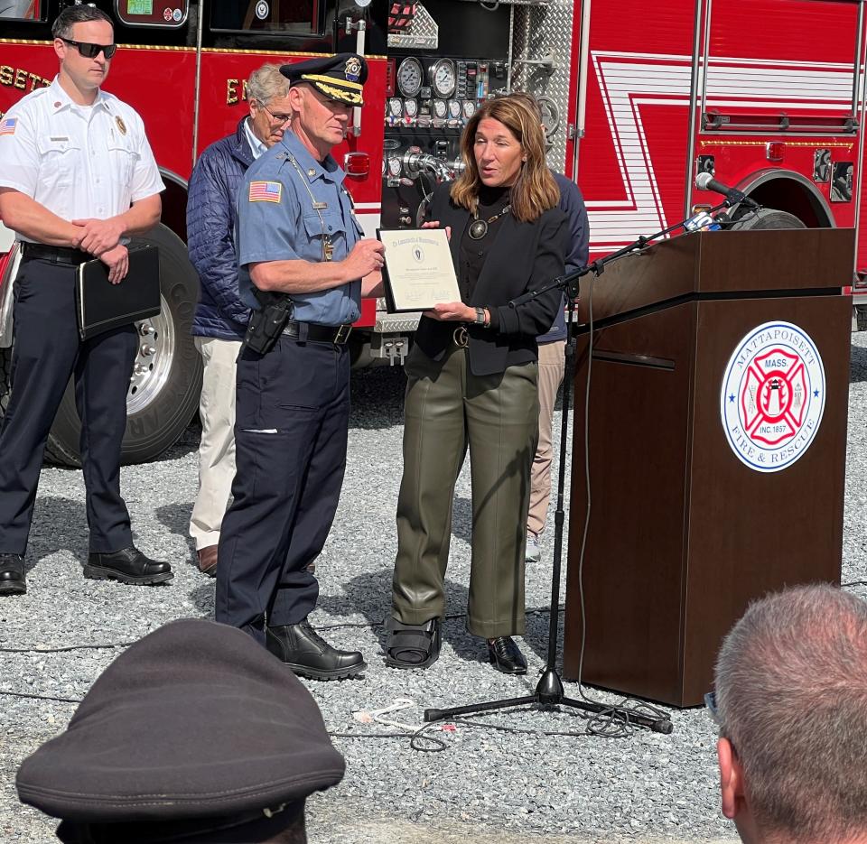 Mattapoisett Police Chief Jason King accepts a certificate of appreciation in behalf of first responders from Lt. Gov. Karyn Polito.