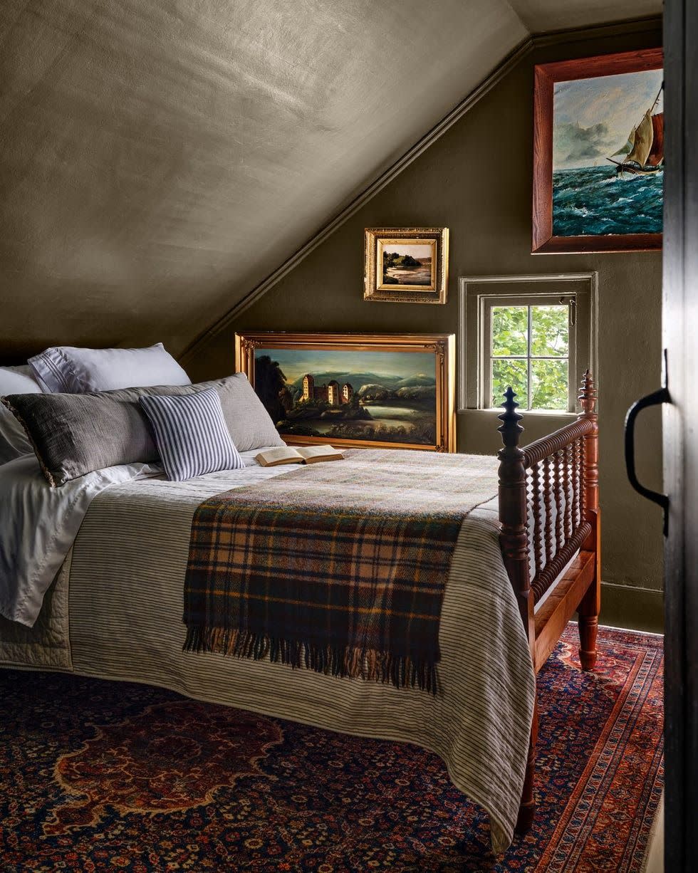 brown bedroom with wood spool bed