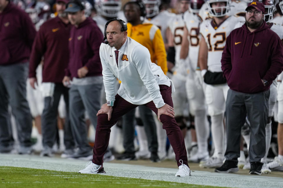 Minnesota head coach P. J. Fleck watches as his team played against Purdue during the second half of an NCAA college football game in West Lafayette, Ind., Saturday, Nov. 11, 2023. (AP Photo/Michael Conroy)