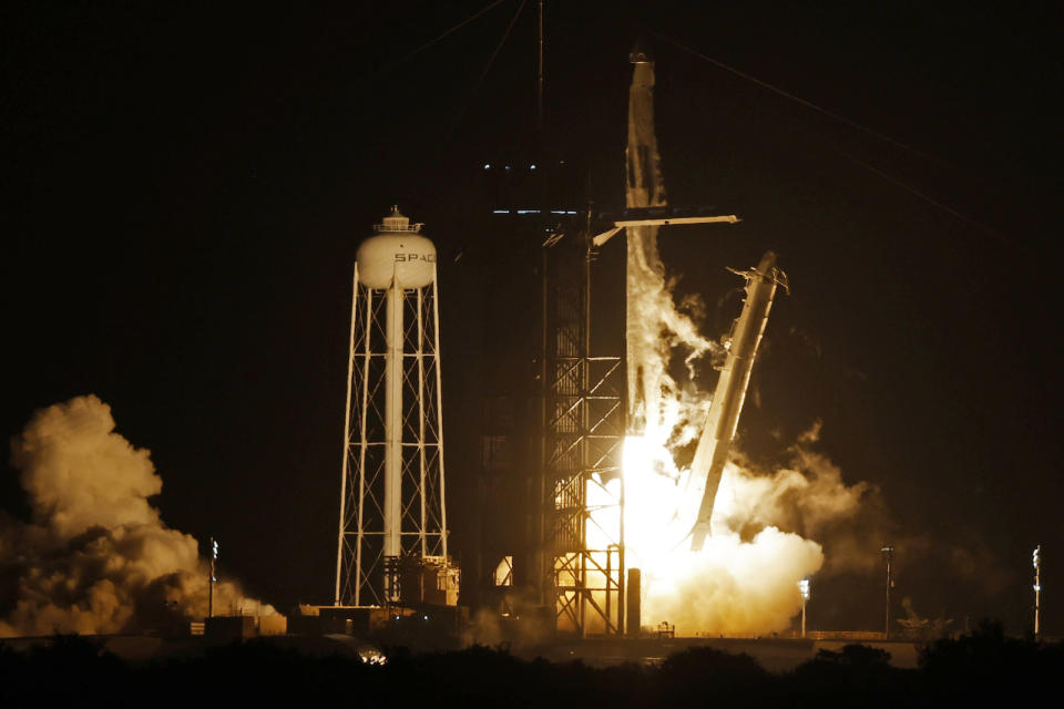 A SpaceX Falcon 9 rocket, with the Crew Dragon capsule, is launched carrying three NASA and one ESA astronauts on a mission to the International Space Station at the Kennedy Space Center in Cape Canaveral, Florida, U.S. November 10, 2021. REUTERS/Joe Skipper - HP1EHBB063F0G