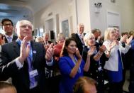 Britain's Conservative MPs Iain Duncan Smith, Priti Patel, Nadine Dorries and Liz Truss applaud as they attend the launch of former British Foreign Secretary Boris Johnson's campaign for the Conservative Party leadership, in London