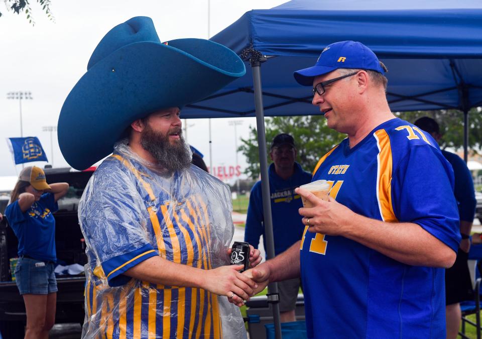 Jackrabbit fans tailgate the morning of the FCS championship game on Sunday, May 16, 2021 outside Toyota Stadium in Frisco, Texas.