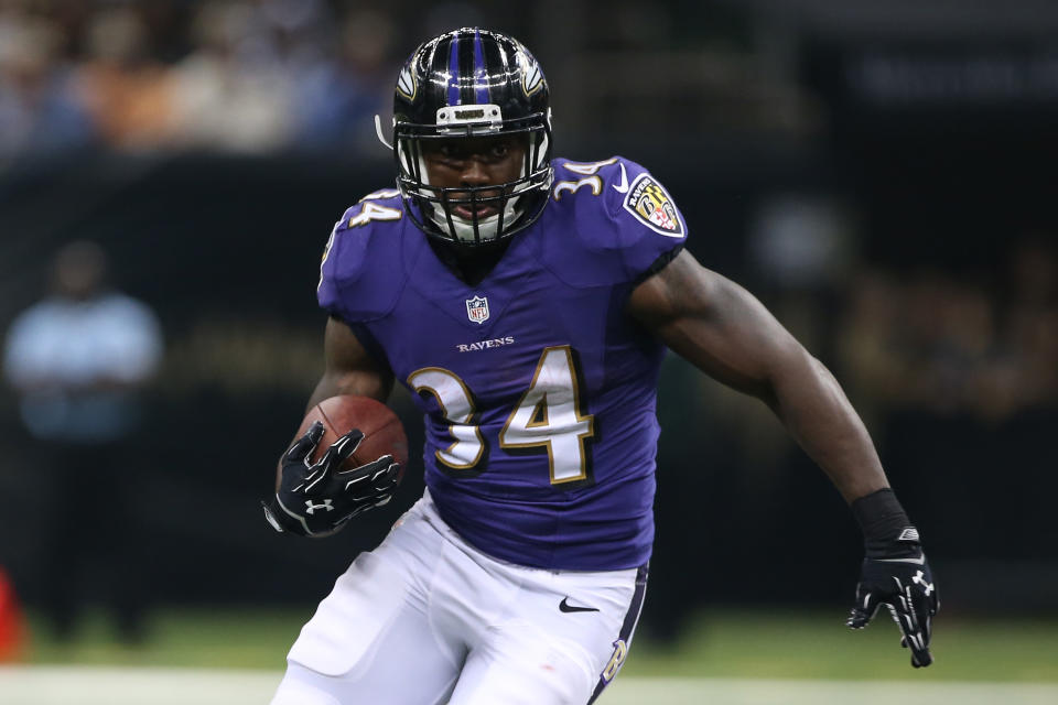 NEW ORLEANS, LA - AUGUST 28:   Lorenzo Taliaferro #34 of the Baltimore Ravens against the New Orleans Saints at the Mercedes-Benz Superdome on August 28, 2014 in New Orleans, Louisiana.  (Photo by Chris Graythen/Getty Images) 