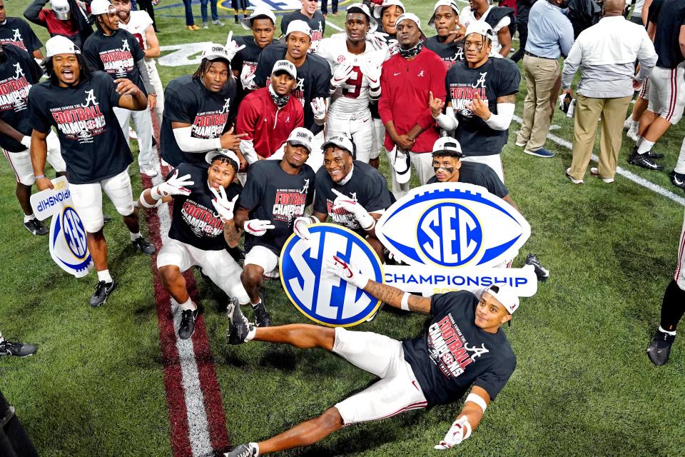 Alabama players celebrated after beating Florida  in the SEC championship.