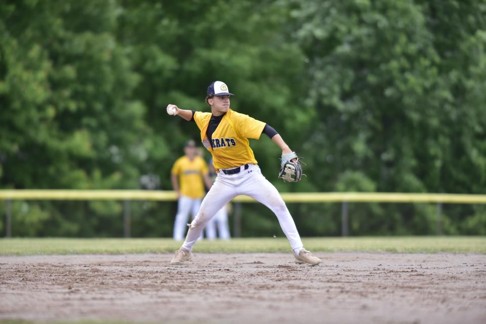 Algonac's Caleb Thomas throws to first base during a practice at Algonac High School on Monday. The Muskrats will face Lansing Catholic in a Division 3 state semifinal on Thursday.