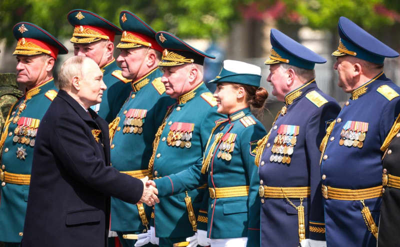 Russia's President Vladimir Putin shakes hands with soldiers during the Victory Day military parade at Red Square in Moscow. Russia celebrates the 79th anniversary of the victory over Nazi Germany in World War II. -/Kremlin/dpa