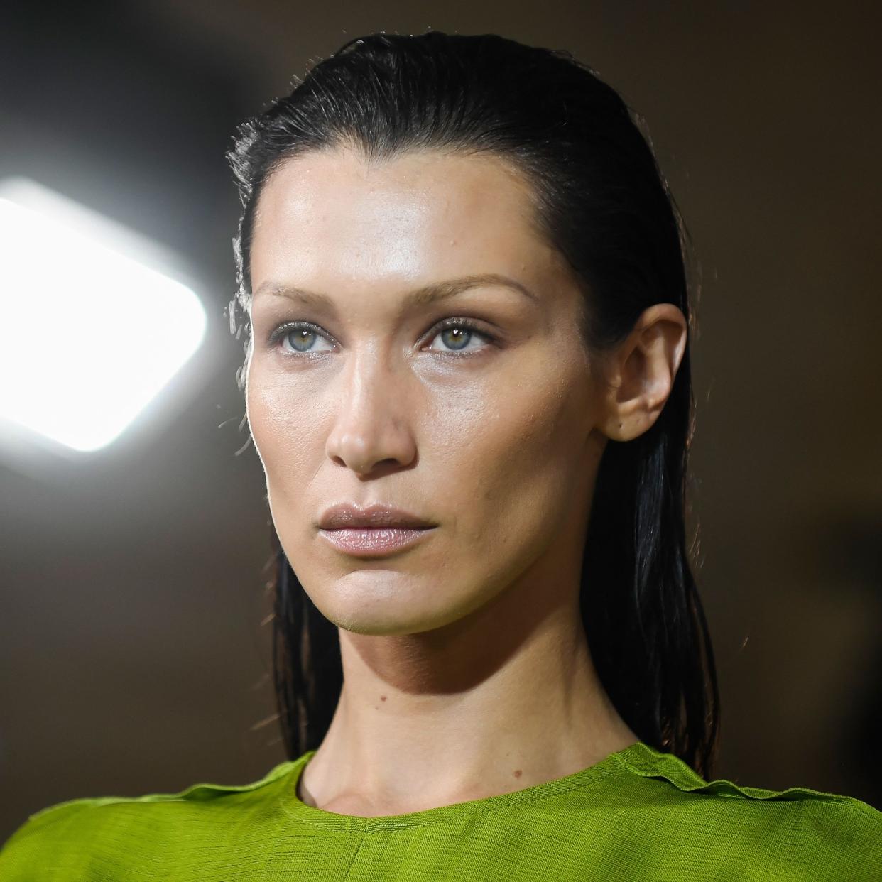  Close-up of Bella Hadid as she walks the runway. 