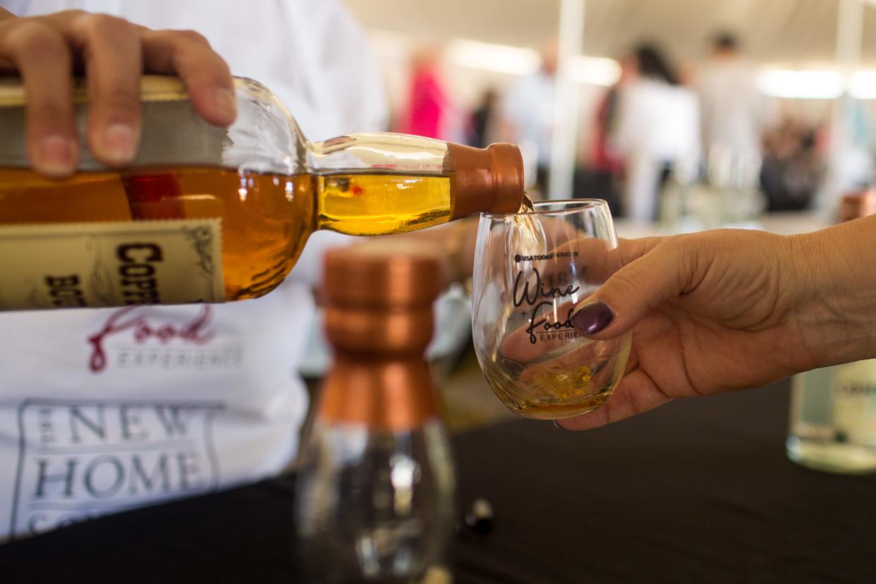 Bourbon from Arizona Distillery Co. is showcased during a Wine & Food Experience in 2019 near Scottsdale, Arizona.