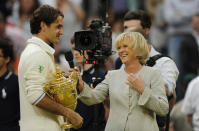 Roger Federer chats to BBC presenter Sue Barker after his Men's Singles Final match against Andy Murray on Day Thirteen of the 2012 Wimbledon Tennis Championships at the All England Lawn Tennis and Croquet Club in London, United Kingdom. Photo: Visionhaus/Ben Radford (Photo by Ben Radford/Corbis via Getty Images)