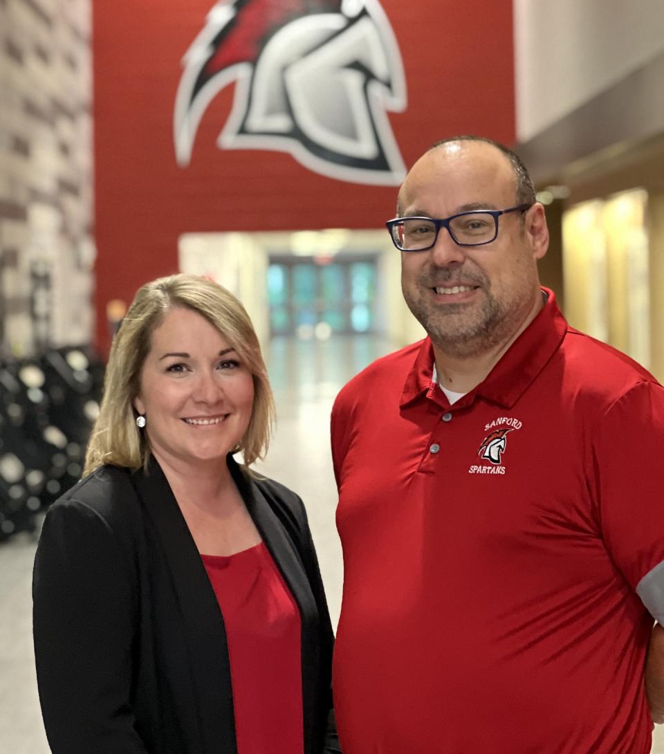 Amanda Doyle, left, takes over as principal of Sanford High School from Matt Petermann, who is the new director of Sanford Regional Technical Center.
