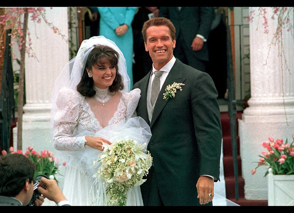 In an April 25, 1986 file photo Actor Arnold Schwarzenegger poses with his bride Maria Shriver following their wedding ceremony in Hyannis, Mass. (AP Photo/file)