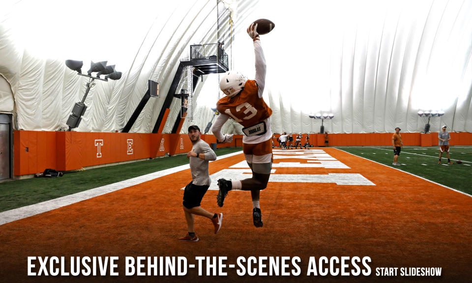 Texas Longhorns football offensive graduate assistant Jordan Salkin (left) looks on as Brennan Eagles catches a pass during practice Wednesday Sept. 4, 2019 in Austin, Tx. (Photo by Edward A. Ornelas)