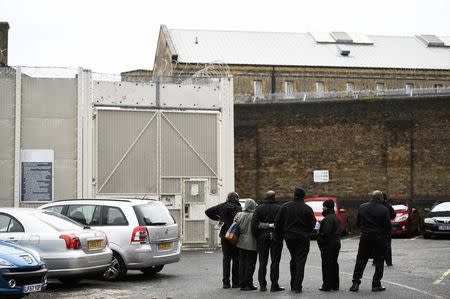 Prison guards stand outside Wandsworth Reform Prison as they take unofficial strike action to protest against staffing levels and health and safety issues, in London, Britain, November 15, 2016. REUTERS/Dylan Martinez