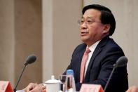 Chinese Vice Minister of Agriculture and Rural Affairs Han Jun attends a news conference on the state of trade negotiations with U.S. in Beijing