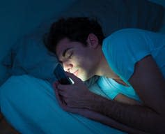 <span class="caption">Leaving social media until the morning isn’t essential, but its still a good way of disconnecting.</span> <span class="attribution"><a class="link " href="https://www.shutterstock.com/image-photo/addicted-social-media-young-man-falling-1386129215?src=9Ed7hUBv7D7Dg4OEGV32ww-1-4" rel="nofollow noopener" target="_blank" data-ylk="slk:Sam Wordley/Shutterstock;elm:context_link;itc:0;sec:content-canvas">Sam Wordley/Shutterstock</a></span>