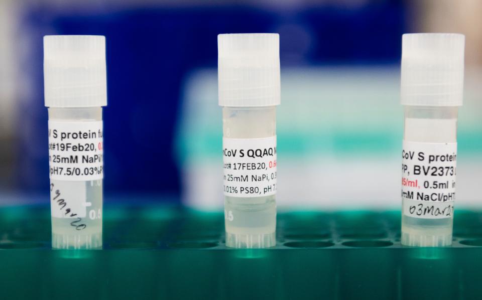 Three potential coronavirus, COVID-19, vaccines are kept in a tray at Novavax labs in Gaithersburg, Maryland on March 20, 2020, one of the labs developing a vaccine for the coronavirus, COVID-19. (Photo by ANDREW CABALLERO-REYNOLDS / AFP) / The erroneous mention[s] appearing in the metadata of this photo by ANDREW CABALLERO-REYNOLDS has been modified in AFP systems in the following manner: [Gaithersburg] instead of [Rockville]. Please immediately remove the erroneous mention[s] from all your online services and delete it (them) from your servers. If you have been authorized by AFP to distribute it (them) to third parties, please ensure that the same actions are carried out by them. Failure to promptly comply with these instructions will entail liability on your part for any continued or post notification usage. Therefore we thank you very much for all your attention and prompt action. We are sorry for the inconvenience this notification may cause and remain at your disposal for any further information you may require. (Photo by ANDREW CABALLERO-REYNOLDS/AFP via Getty Images)