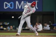 Los Angeles Angels' Shohei Ohtani connects for a double in the fifth inning of the team's baseball game against the Texas Rangers in Arlington, Texas, Tuesday, Aug. 3, 2021. (AP Photo/Tony Gutierrez)