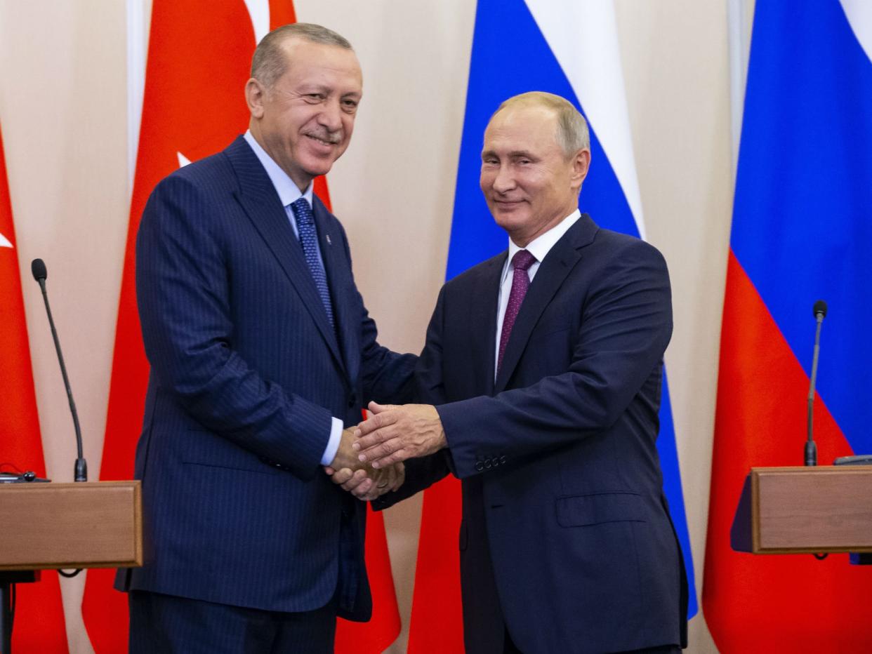 Russian President Vladimir Putin, right, and Turkish President Recep Tayyip Erdogan after talks in Sochi: AP