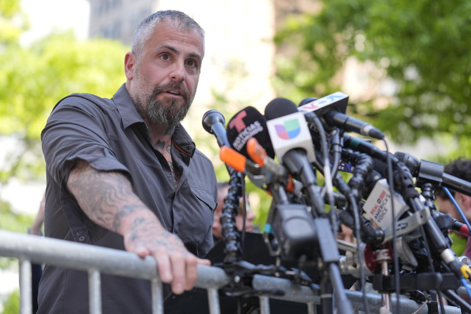 Former Washington, D.C. police officer Michael Fanone speaks to reporters in support of President Joe Biden across the street from former President Donald Trump's criminal trial in New York, Tuesday, May 28, 2024. (AP Photo/Seth Wenig)