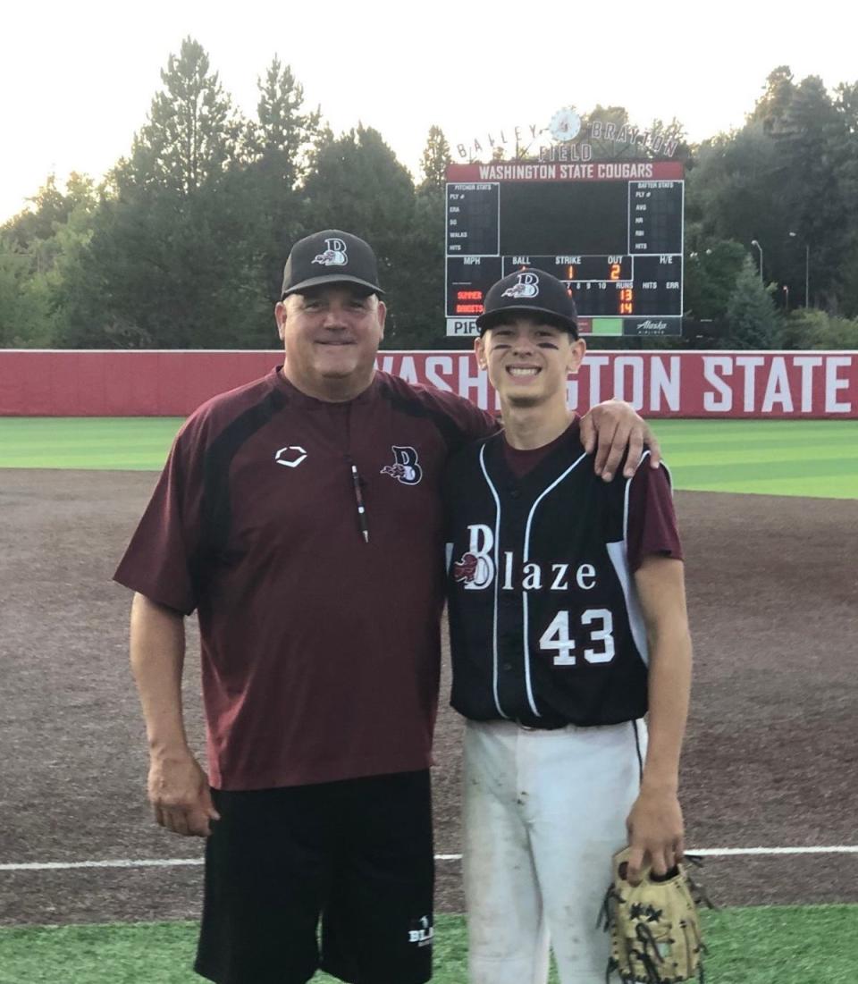 Terrel Hansen, now a Kitsap County Public Works employee, with his son Tyler, a second baseman for South Kitsap.