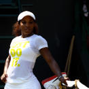 LONDON, ENGLAND - JULY 26: Serena Williams of the United States stretches during the practice session ahead of the 2012 London Olympic Games at the All England Lawn Tennis and Croquet Club in Wimbledon on July 26, 2012 in London, England. (Photo by Clive Brunskill/Getty Images)