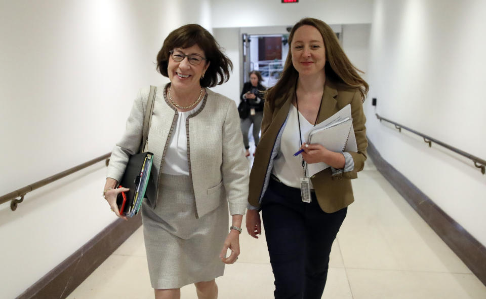 Sen. Susan Collins, R-Maine, left, walks, on Capitol Hill, Monday, Sept. 24, 2018, in Washington. A second allegation of sexual misconduct has emerged against Judge Brett Kavanaugh, a development that has further imperiled his nomination to the Supreme Court, forced the White House and Senate Republicans onto the defensive and fueled calls from Democrats to postpone further action on his confirmation. President Donald Trump is so far standing by his nominee. (AP Photo/Alex Brandon)