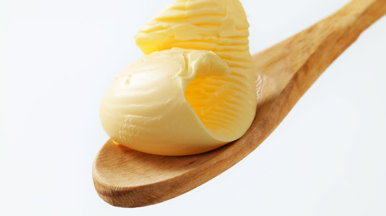 Butter on a wooden spoon