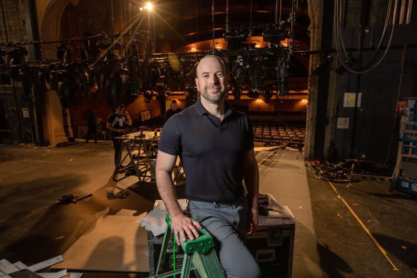 Pasadena, CA - March 31: Danny Feldman, artistic director of Pasadena Playhouse, sits for portraits backstage at the Pasadena Playhouse on on Friday, March 31, 2023 in Pasadena, CA. (Brian van der Brug / Los Angeles Times)