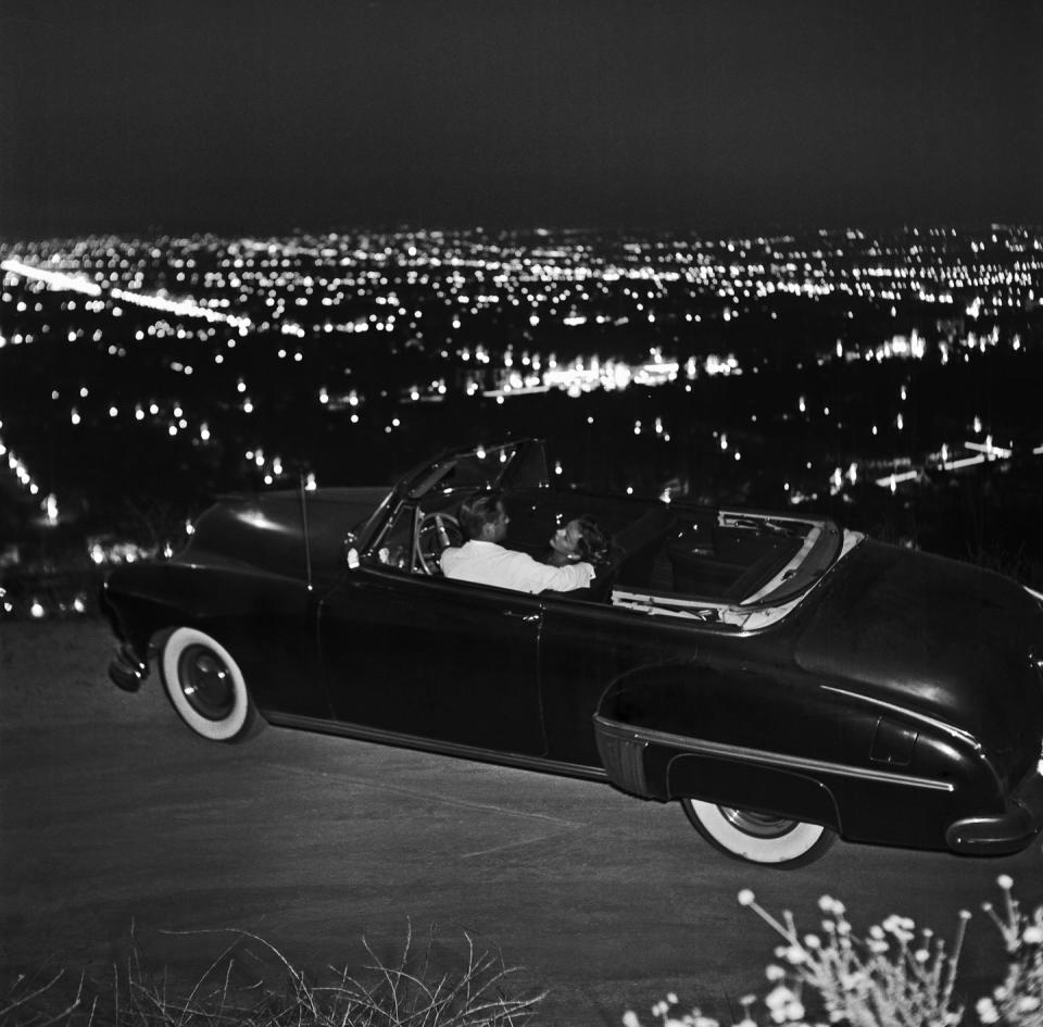 <p>We can't think of anything more romantic than checking out the Los Angeles skyline in a retro car back in 1951. </p>