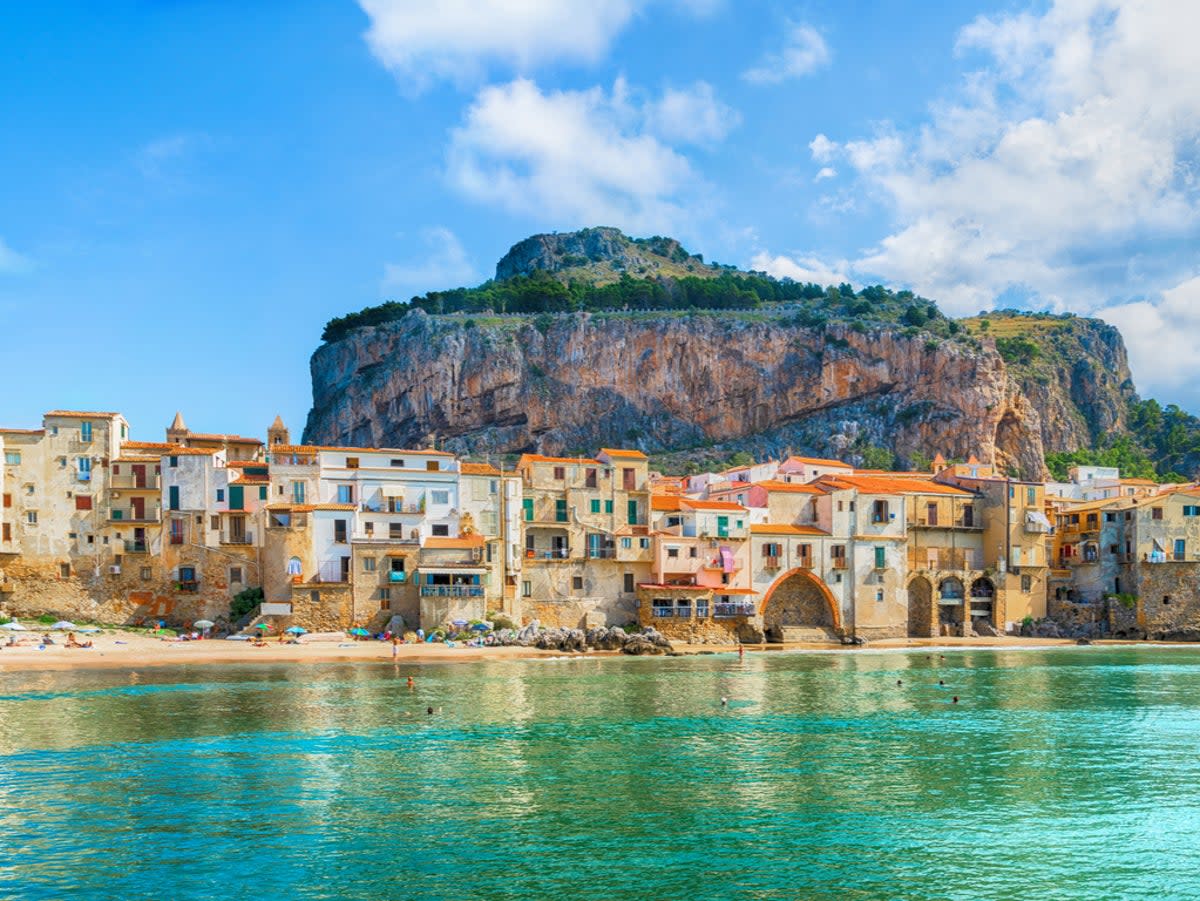 The Mediterranean island is a tourist-favourite thanks to enchanting towns like Cefalu (Getty)